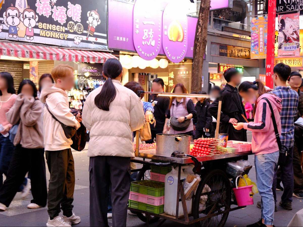 View of street vendors in Ximending