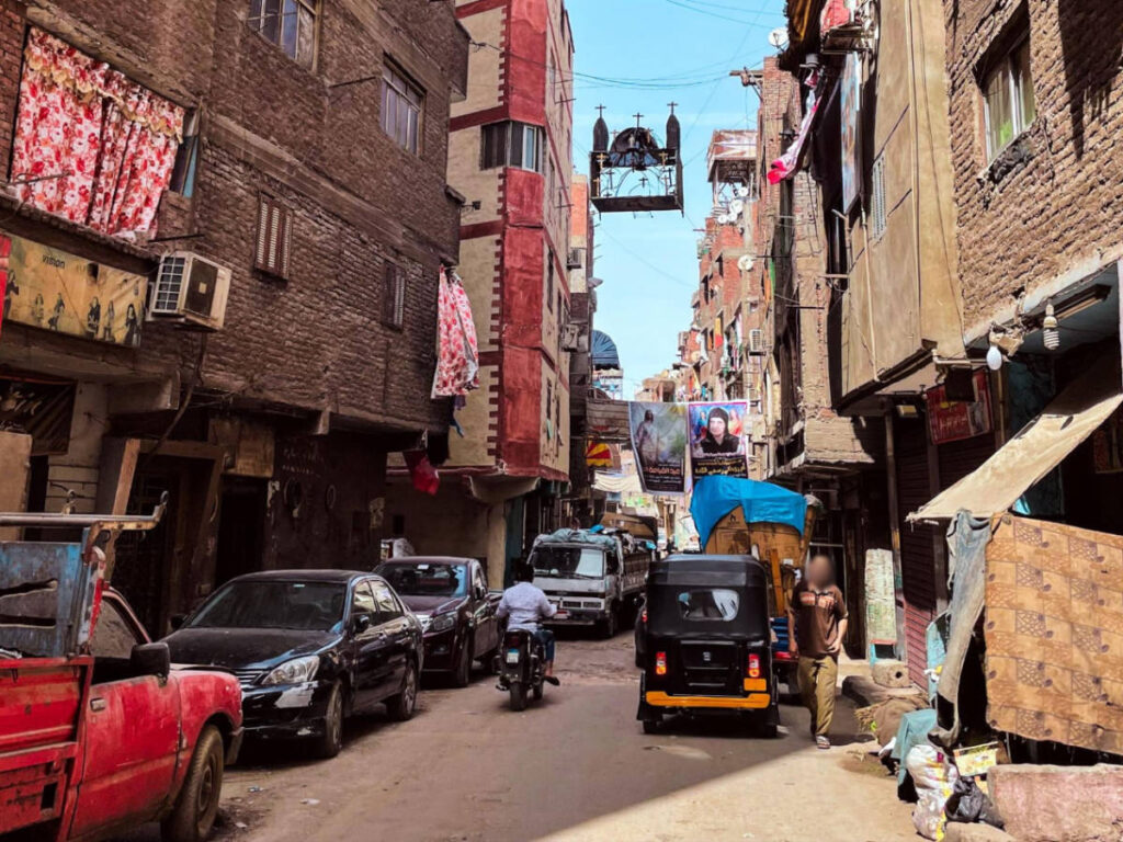 Vehicles parked on a street in Cairo