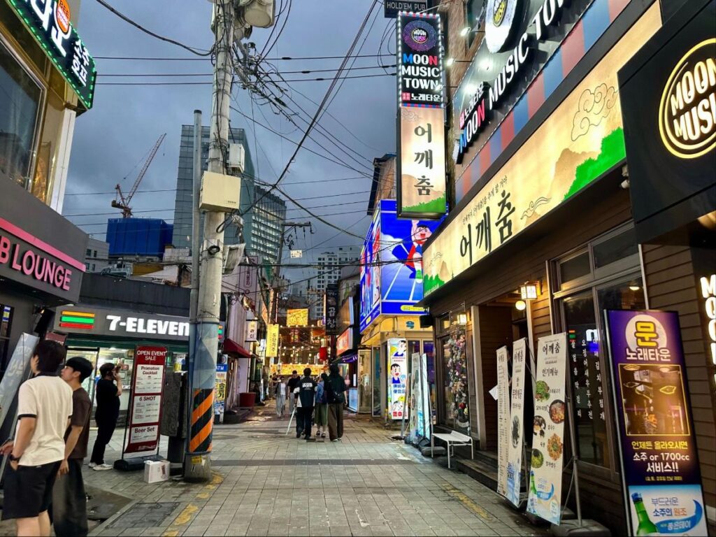 View of a street in Seomyeon filled with bars, clubs and karaoke rooms