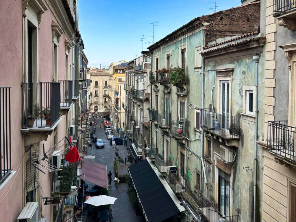 Overlooking look at the street in Catania surrounded by old buildings