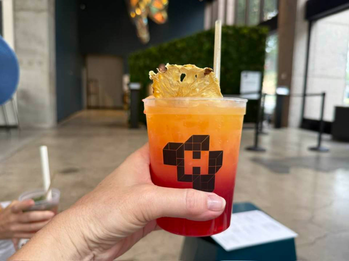 Closeup look of a hand holding a summer drink