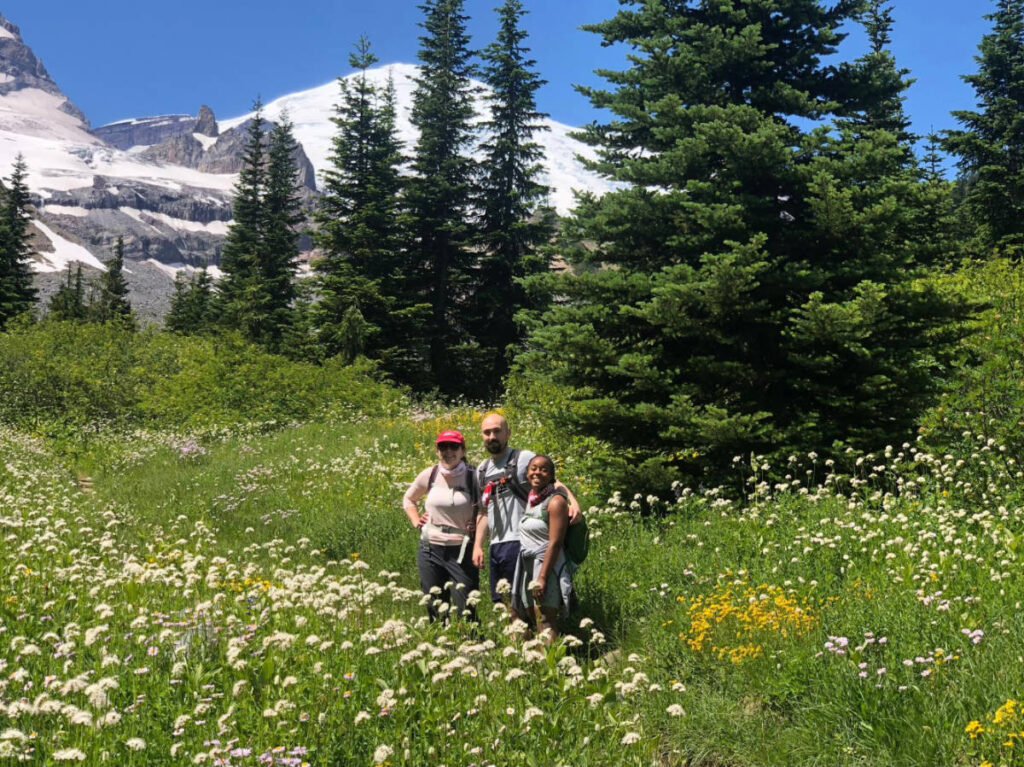 The author Chelsea Booker with her husband and sister in law during their hike at Summerland trail
