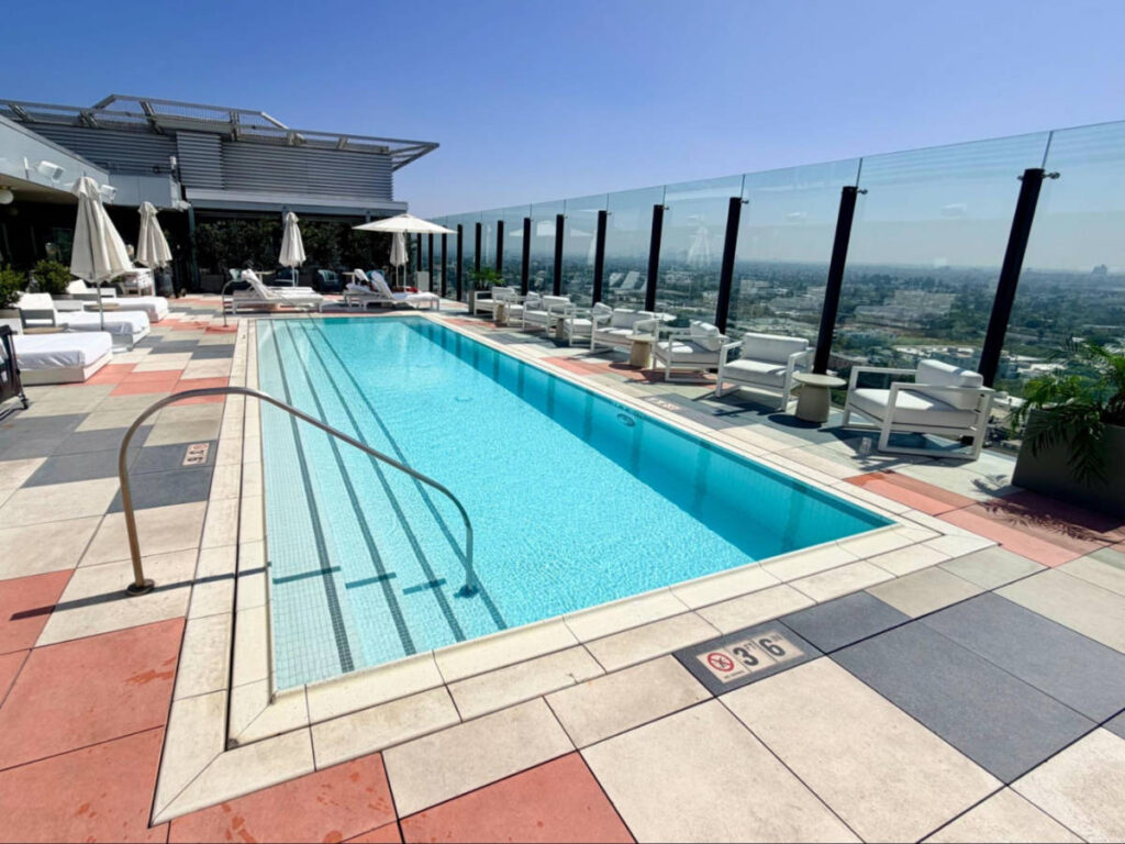 View of the rooftop pool with an overlooking view of the city