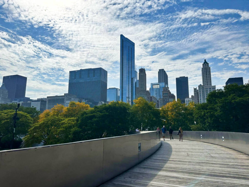 Scenic cityscape view from a boardwalk on a sunny day