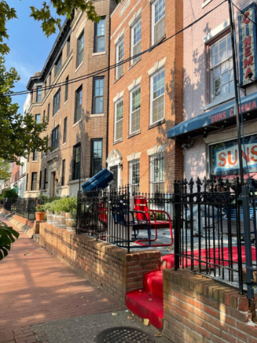 Exterior view of the Suns Cinema and the neighborhood in Mt. Pleasant