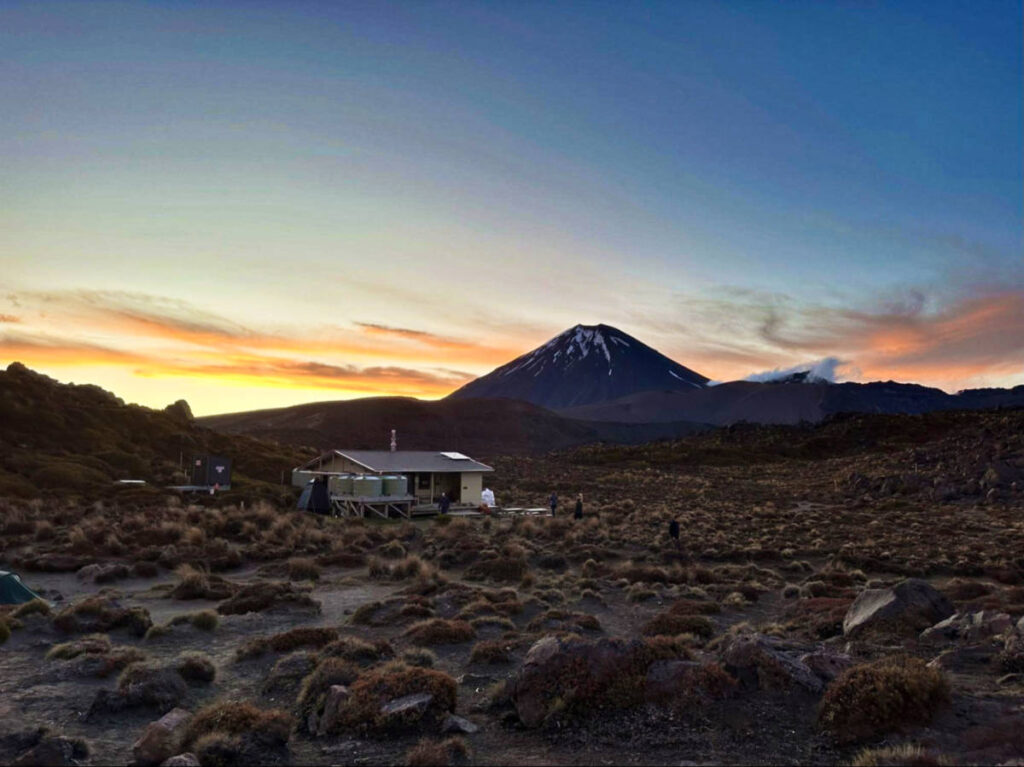 The Oturere Hut with the Mt. Ngauruhoe in the background at sunset