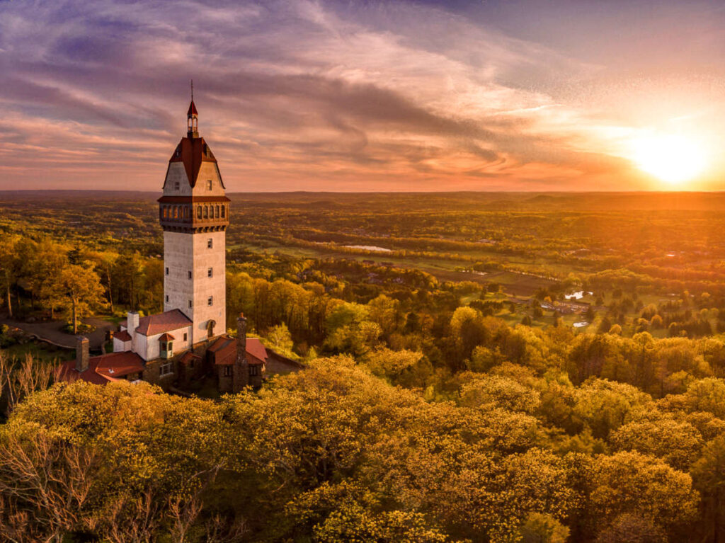 Scenic view of the sunset over the Heublein Tower on Talcott Mountain