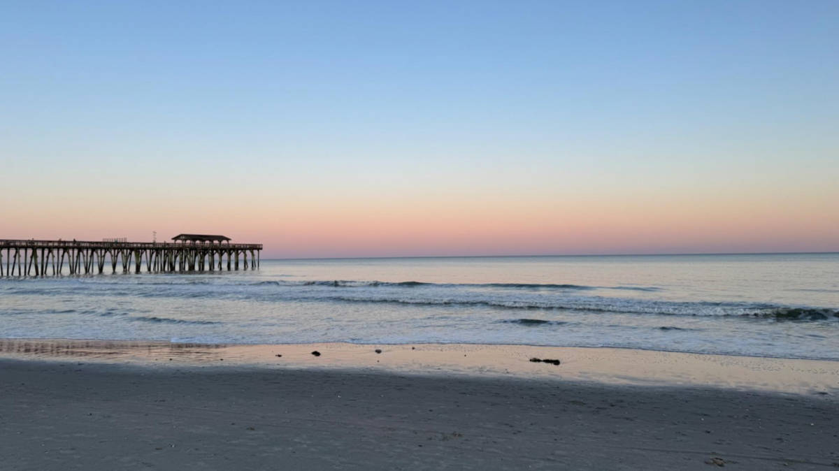 Scenic view of the sunset at Surfside Beach from the shoreline