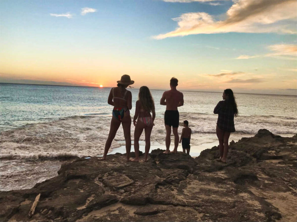 People enjoying the sunset at Makua Beach