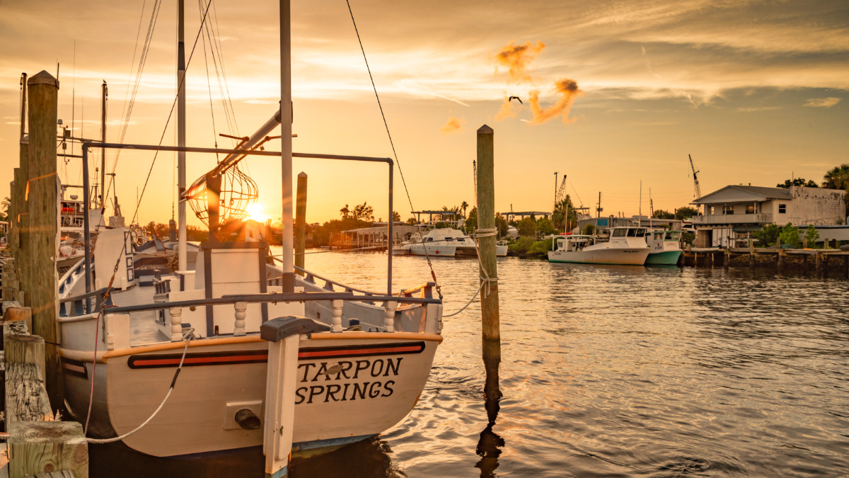 A docked boat in Tarpon Springs at sunset