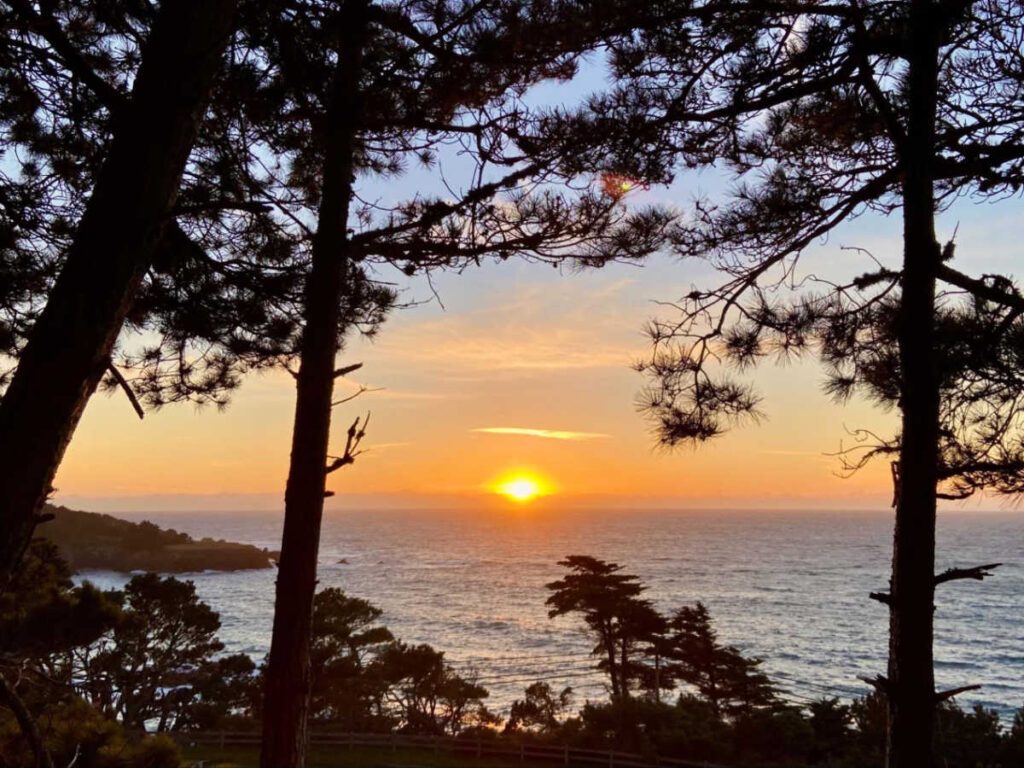 Scenic view of the sunset over the ocean seen from a Mendocino hiking trail