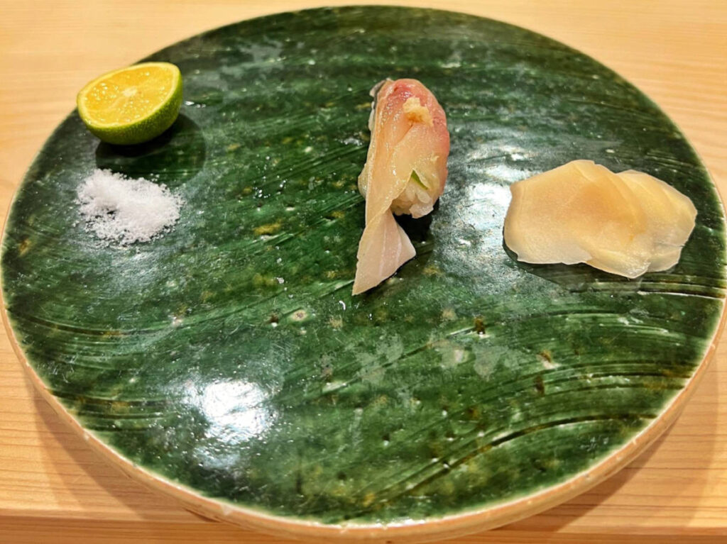 Closeup look of a plate with sushi omakase from Sushi Sanshi