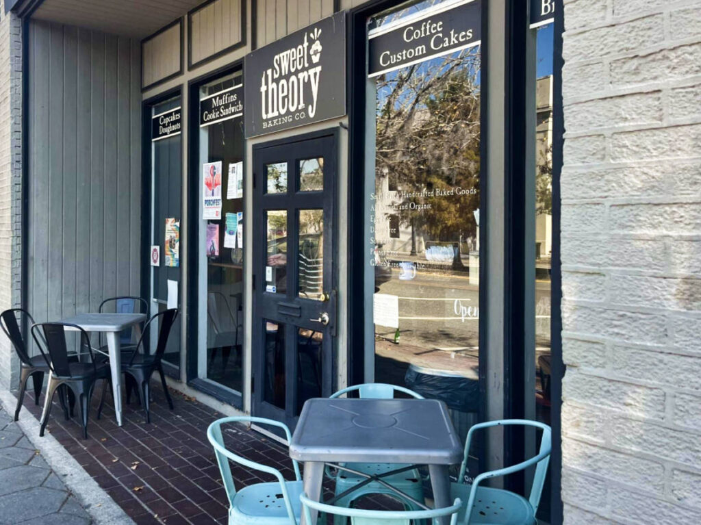 View of the outdoor tables and chairs at the entrance of Sweet Theory Baking Co.