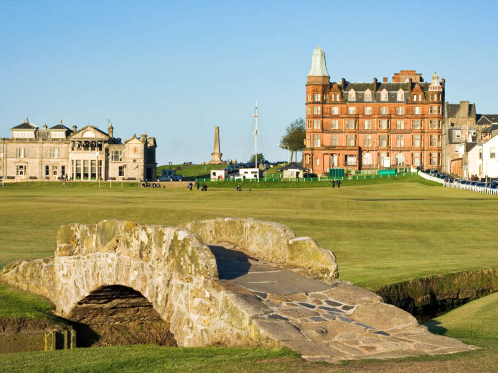 View of the famous Swilcan bridge with the St Andrews skyline