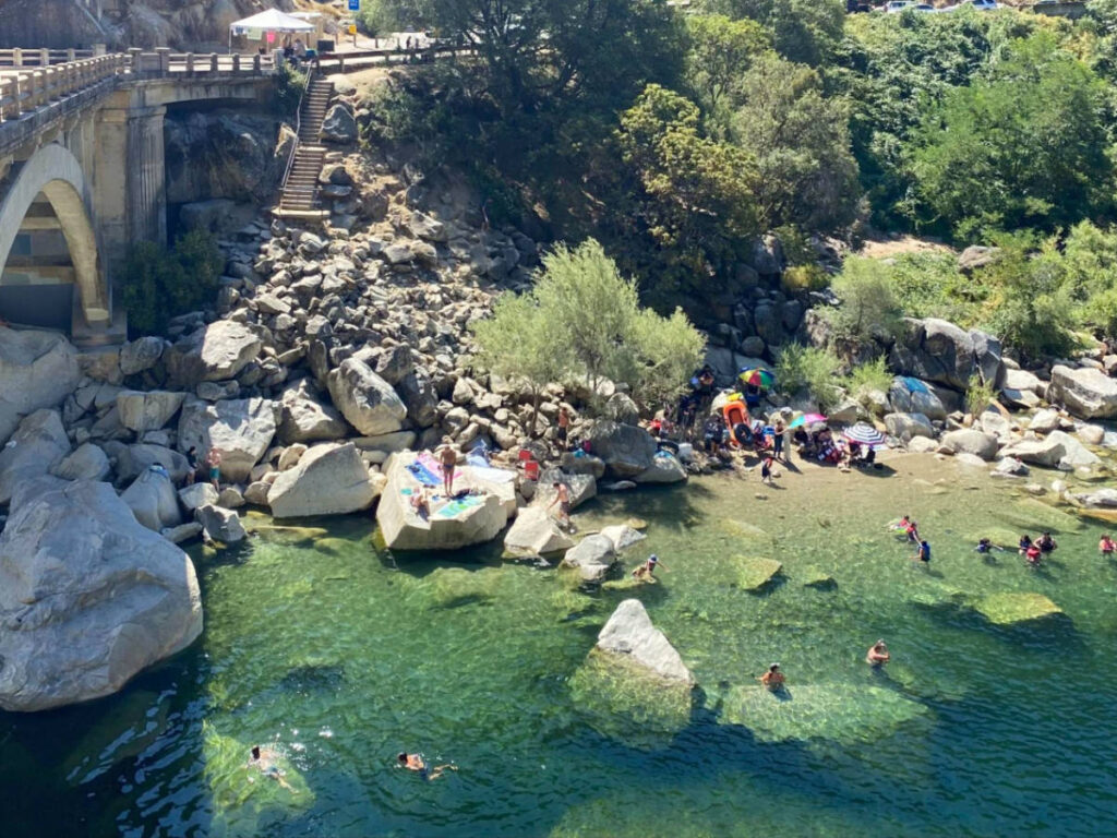 People swimming at Hoyt’s Crossing seen from above