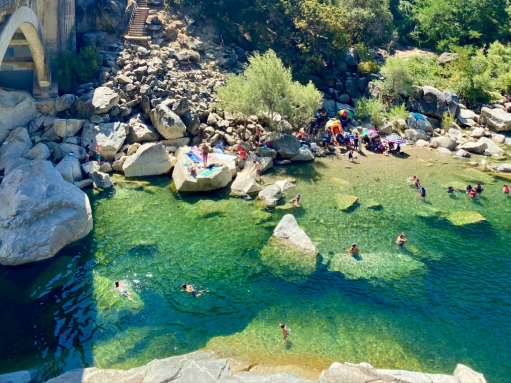 People swimming at Hoyt’s Crossing in the South Yuba River viewed from above