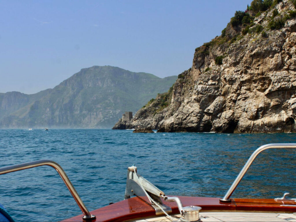 A boat sailing on calm waters.
