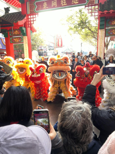 People watching the lion dance at Sydney Chinatown