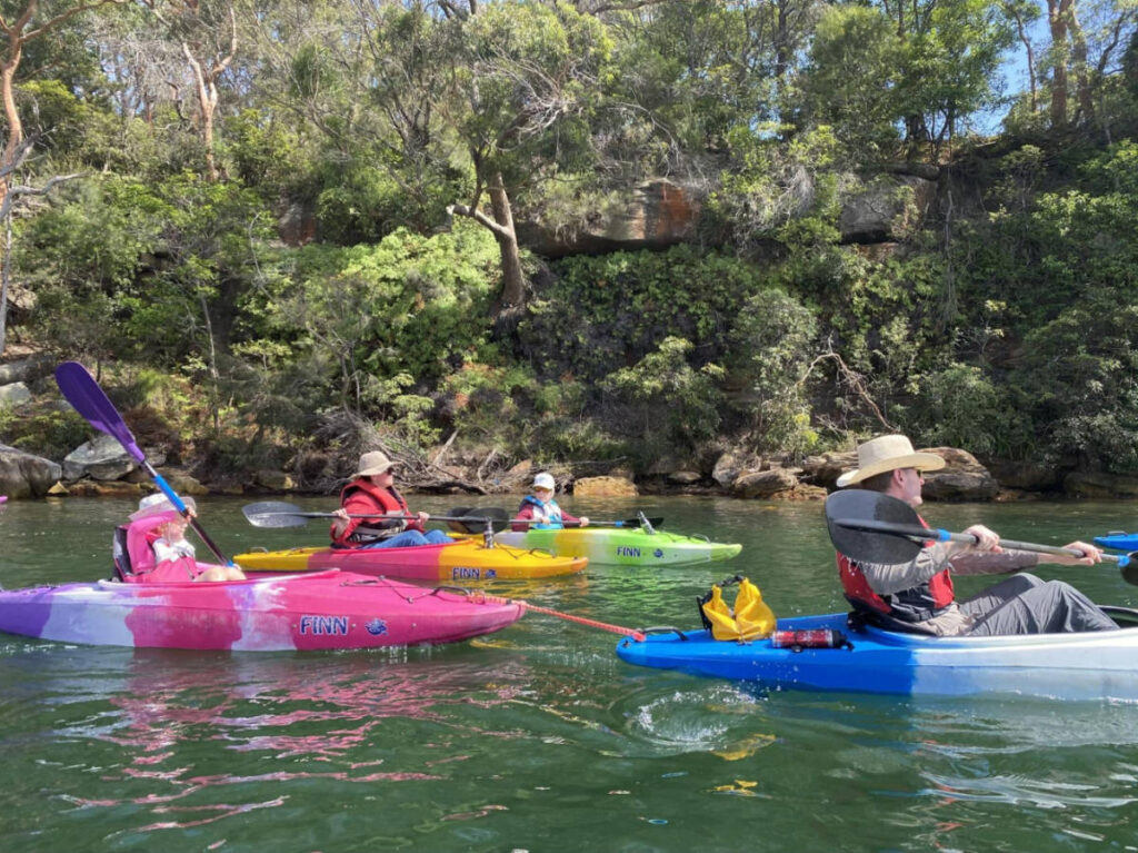 People on a colorful kayak 