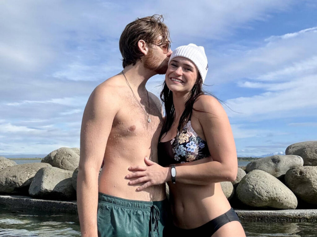 The author, Betty with her boyfriend enjoying their thermal bath in Þingvellir National Park