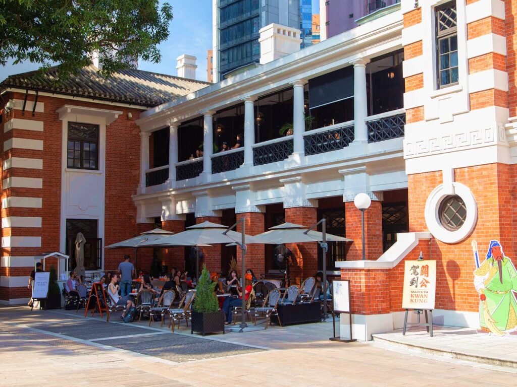 People dining Al fresco in the main courtyard at Tai Kwun