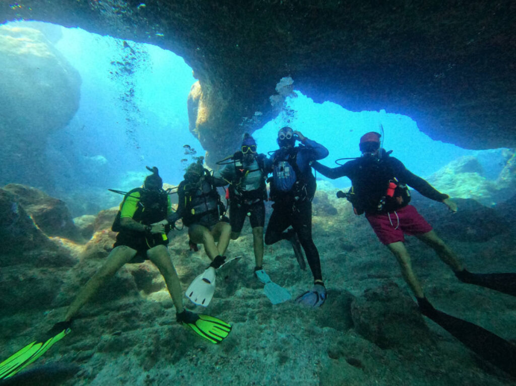 The divers under the water