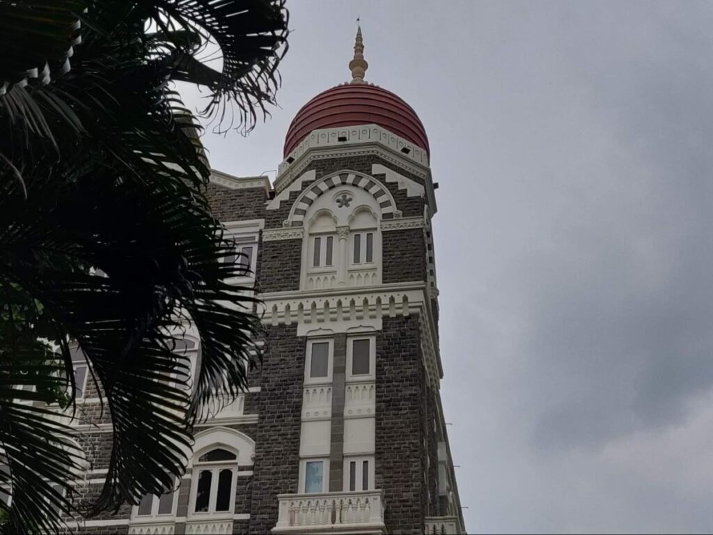 View of the stone facade of the historic Taj Mahal Palace
