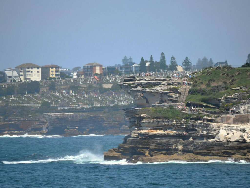 View of the people at the cliffsides of Tamarama Beach and Bronte Beach