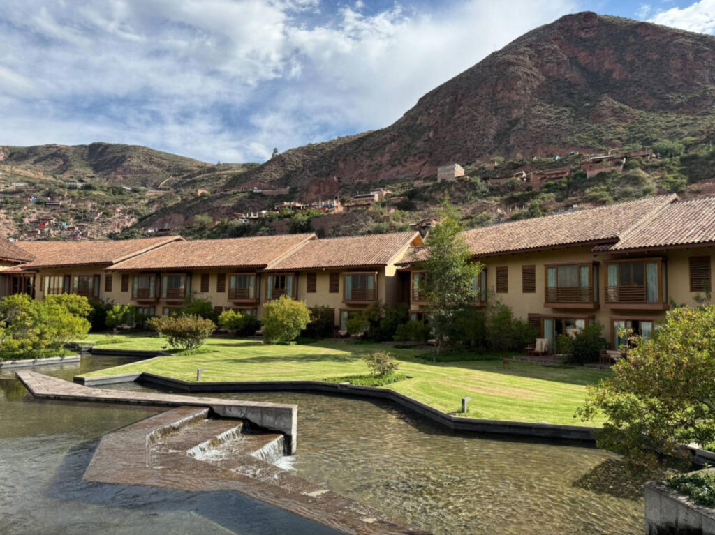 View of the lush greenery and the hills behind the Tambo del Inka