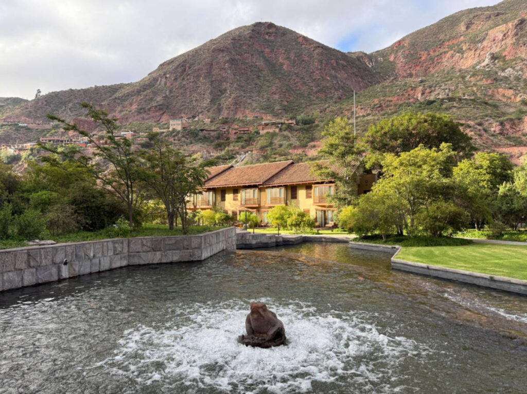 View of the hills behind the Tambo del Inka and the fountain pool in front