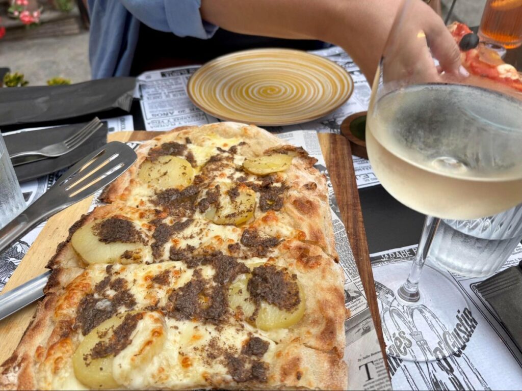 A serving of a Potato pizza from Taverna Bistrot