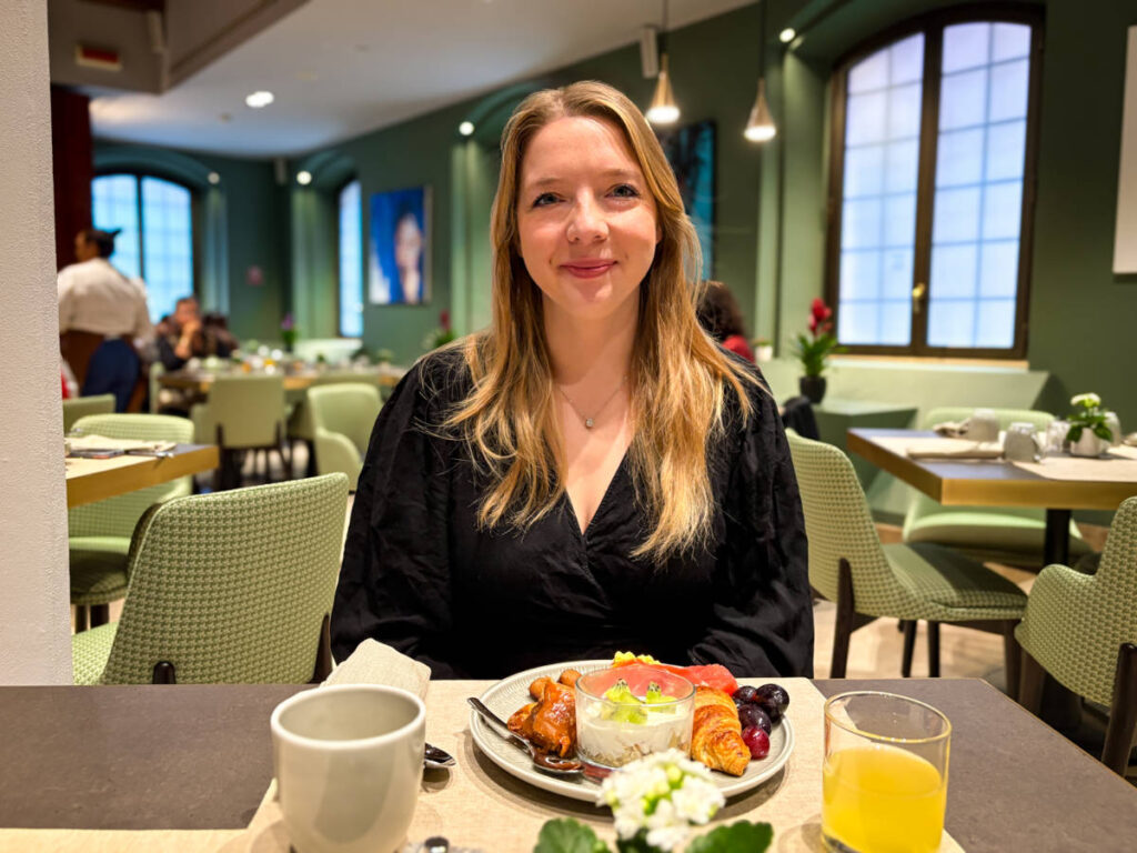 The author Taylor Herperger, enjoying her breakfast at Hilton Molino Stucky