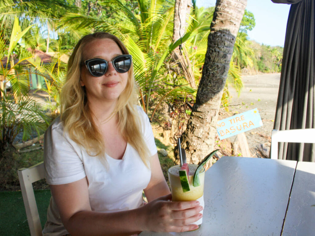 The author Taylor Herperger holding a fruit shake during one of her vacation
