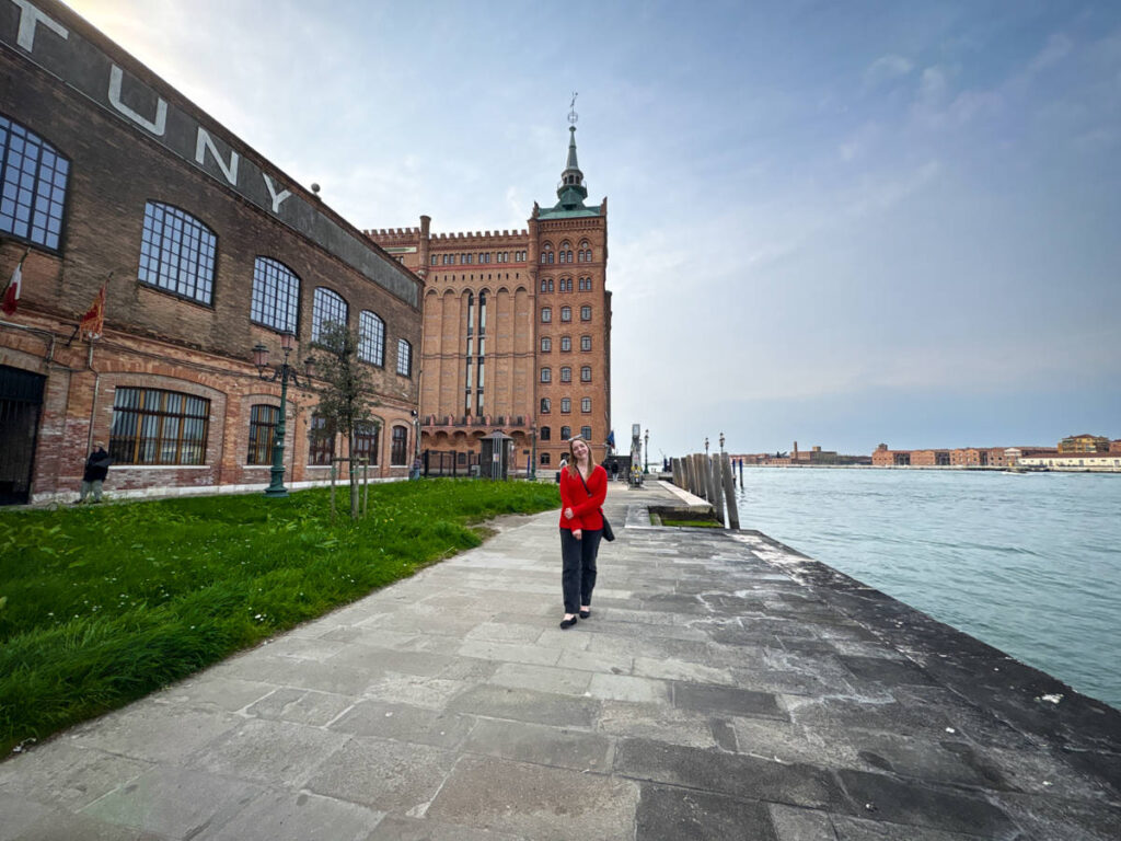 The author Taylor Herperger, strolling near the canal in Giudecca