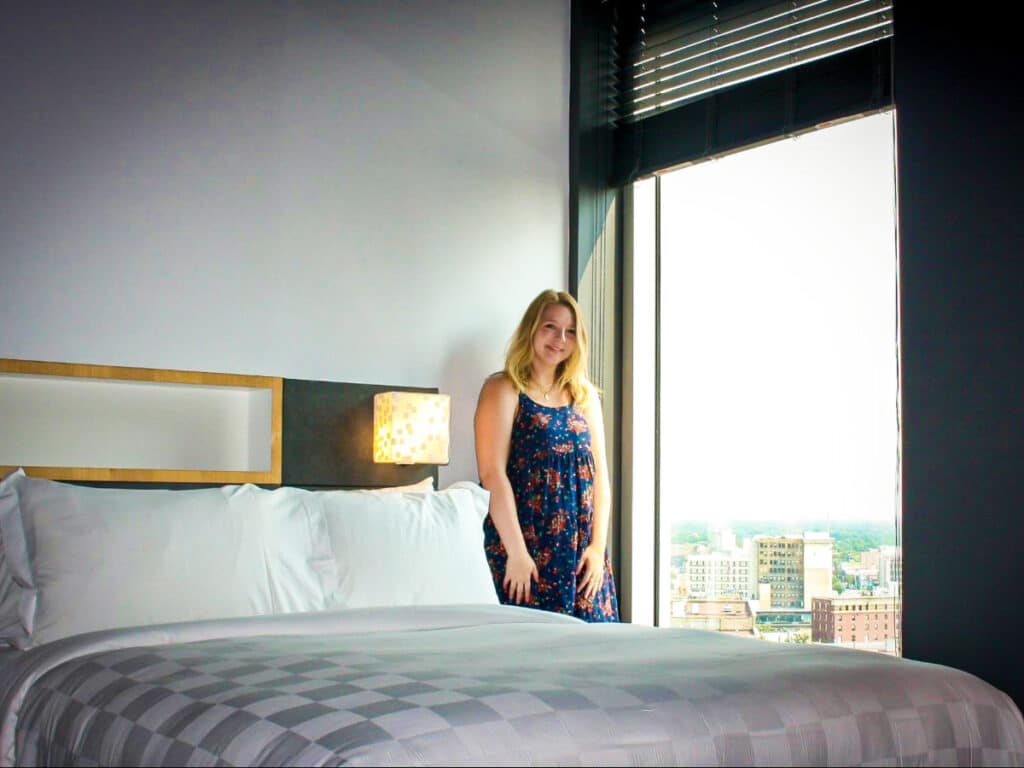 The author Taylor Herperger, posing at the Alt Hotel room