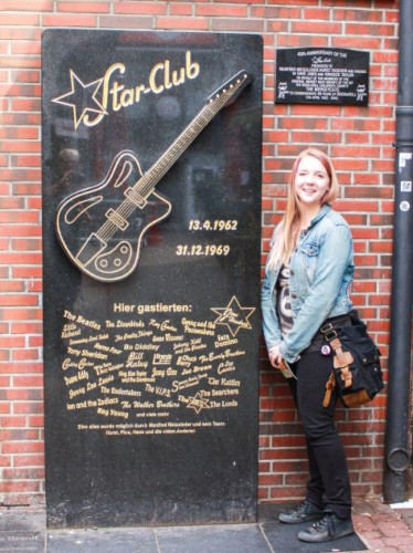 Travel Lemming's Senior Editor Taylor posing for a photo at the former site of the Star Club in Hamburg