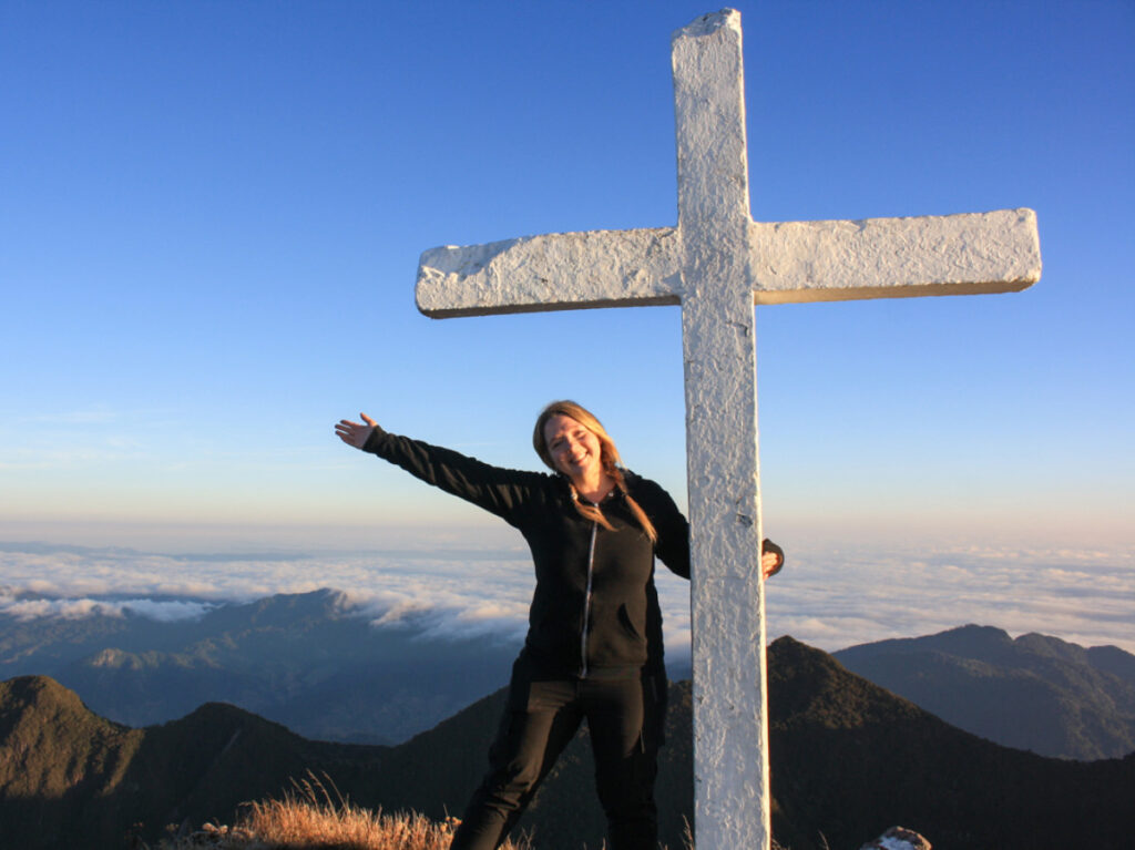 The author Taylor Herperger, posing for a photo at the top of Volcan Baru in Boquete