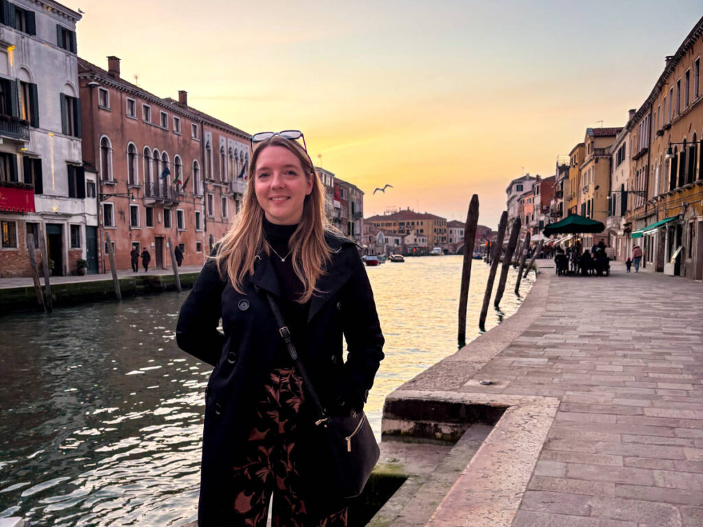The author Taylor Herperger, enjoying the sunset views of Cannaregio