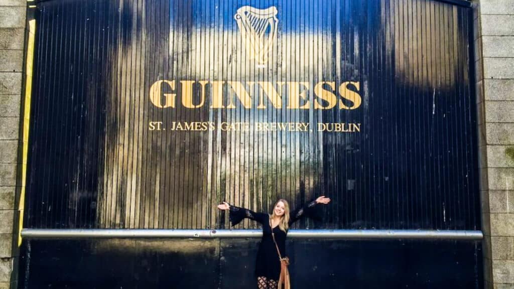 The author Taylor Herperger, posing in front of the Guinness St. Jamess Gate Brewery