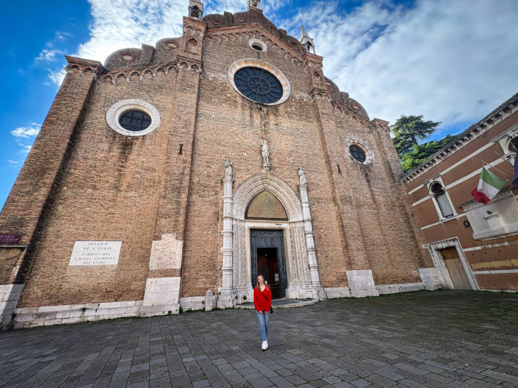 The author Taylor Herperger, posing for a photo in front of the Basilica S.Maria Gloriosa dei Frari