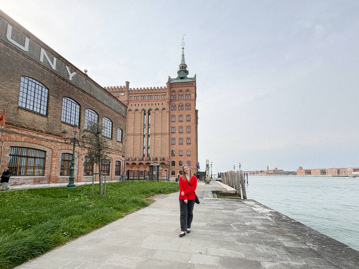 The author Taylor Herperger with the view of the Hilton Molino Stucky