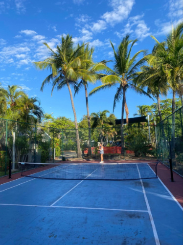 Author Laura playing tennis at the RV park’s courts