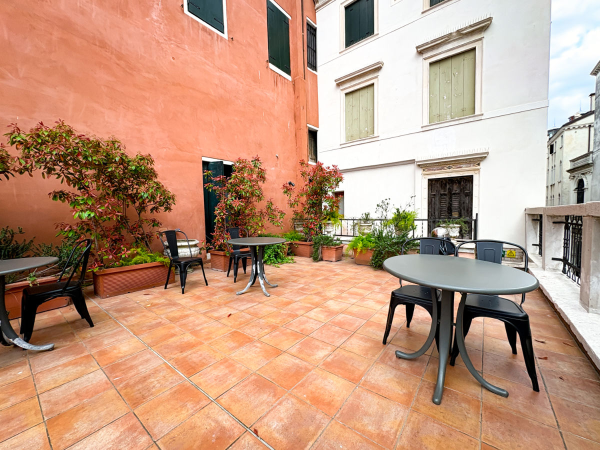 View of the seating area at the Terrace of Hotel Rialto