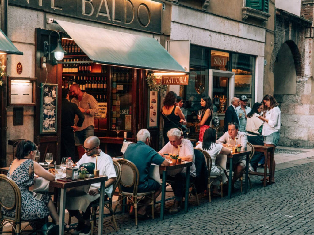 People dining on the terrace of Caffè Monte Baldo