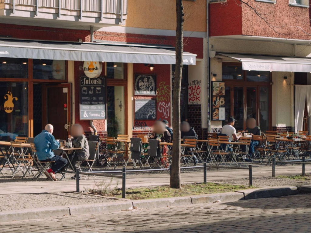 People chilling at a terrace in Friedrichshain