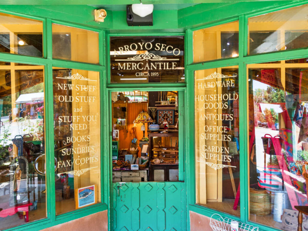 View of the vibrant entrance door and exterior of Arroyo Seco Mercantile