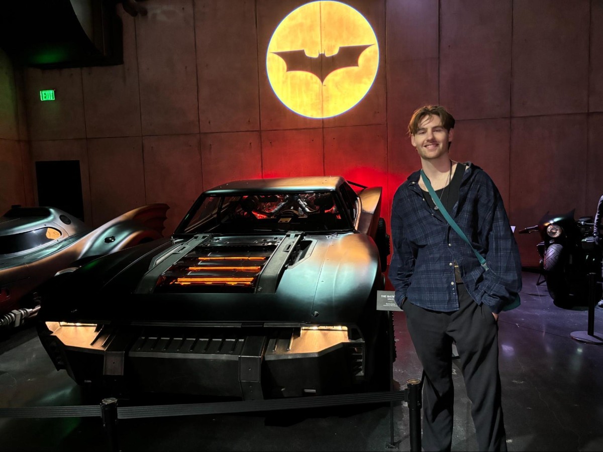 Michael taking a pic with the Batmobile