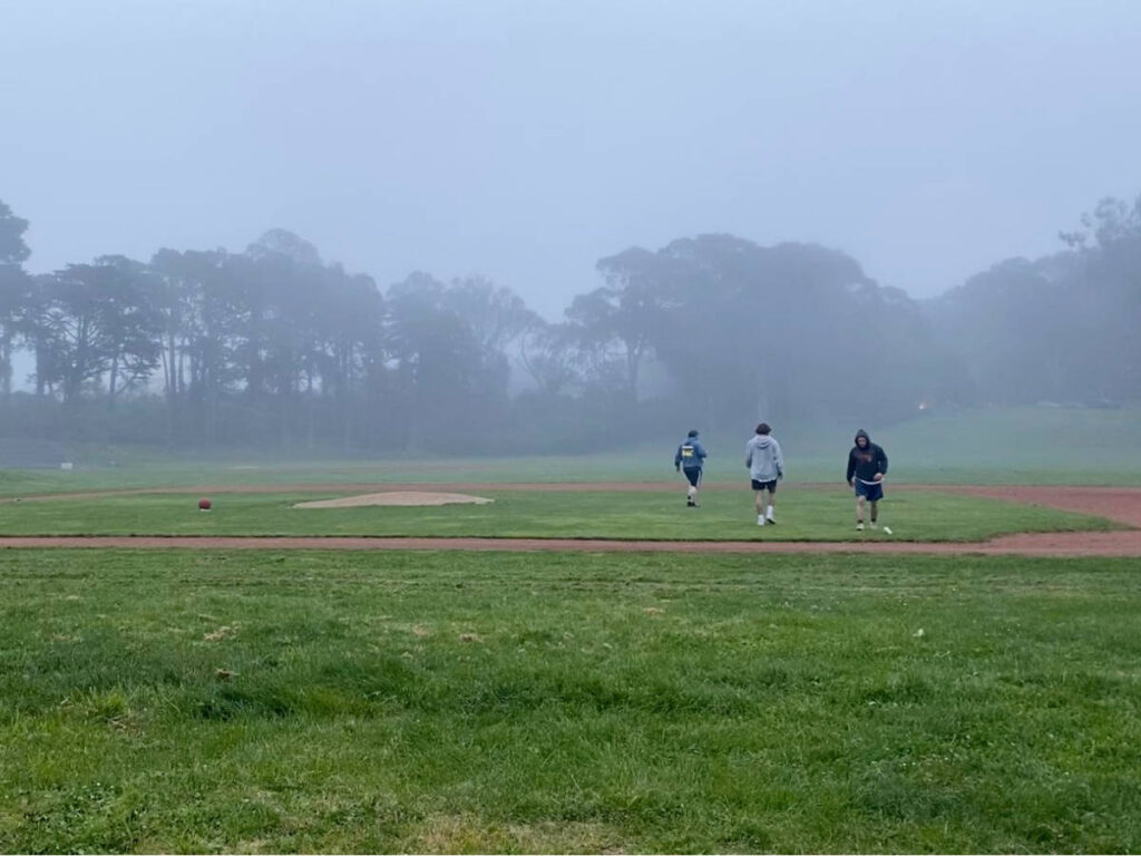 The author Laura McFarland with her friends playing kickball at the Big Rec baseball fields