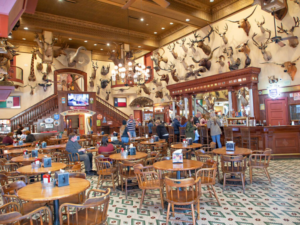 People enjoying some drinks at The Buckhorn Saloon and Texas Ranger Museum