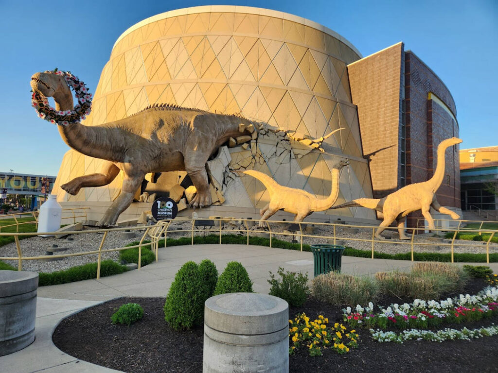 View of the huge sculptures of the dinosaurs outside The Children’s Museum of Indianapolis